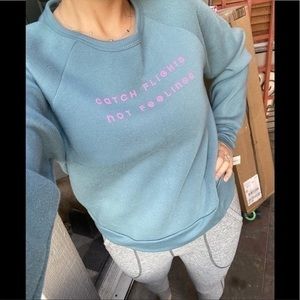 CATCH FLIGHTS NOT FEELINGS sweater - teal & pink